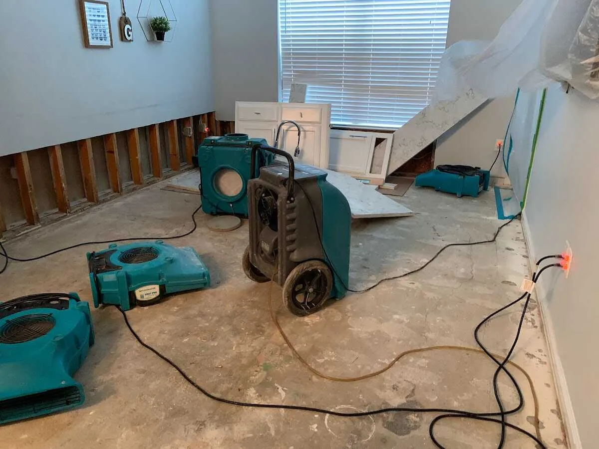 Dehumidifier in flood-cut room for Water Damage Restoration in St. Michael